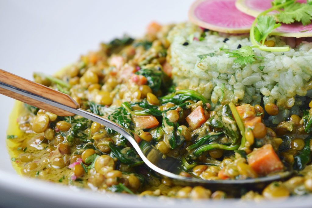 Plated Coconut Curried Lentils with Spinach 